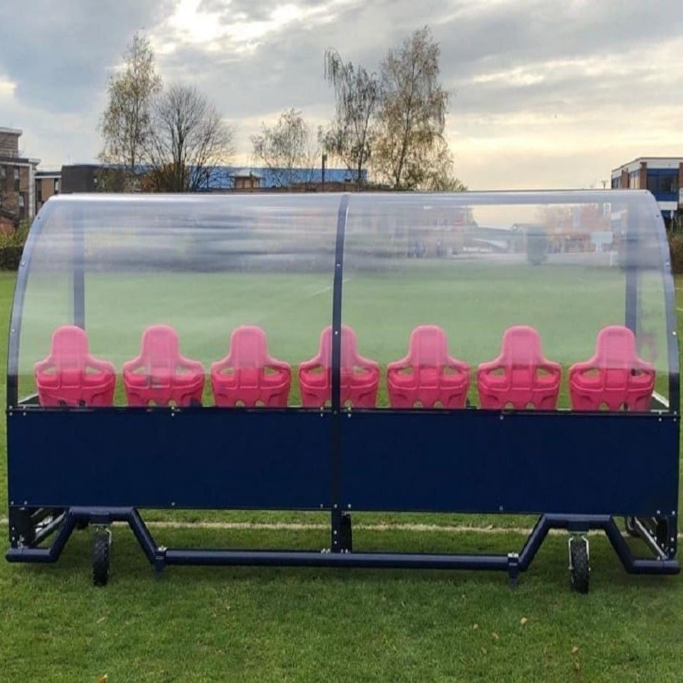 football dugout with red seats